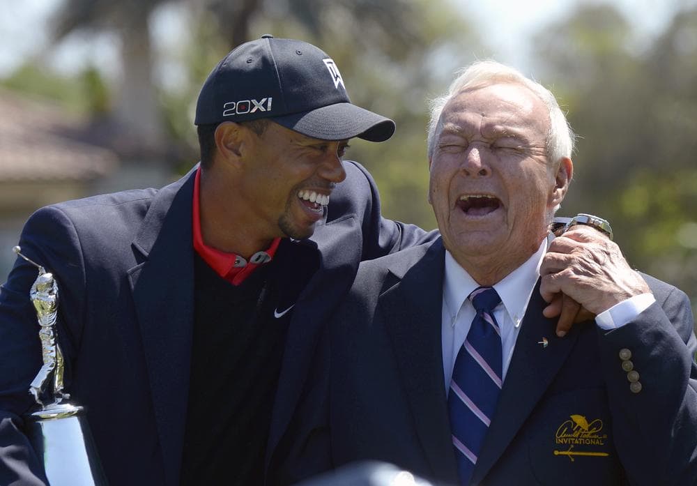 Tiger Woods and Arnold Palmer share a laugh as Woods returns to No. 1 for the first time in 29 months. (AP/Phelan M. Ebenhack)