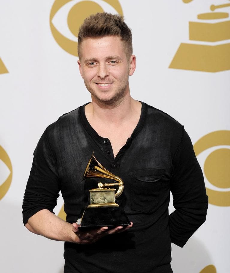 Ryan Tedder poses backstage with the award for album of the year for Adele's &quot;21&quot; at the 54th annual Grammy Awards on Feb. 12, 2012 in Los Angeles. (Mark J. Terrill/AP)