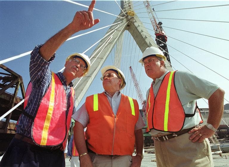 Big Dig chief Andrew S. Natsios, left, tours the Zakim Bridge, still under construction, with Boston Mayor Thomas Menino, right, and bridge engineer Al McPhail on Aug. 28, 2000. (Michael Dwyer/AP)