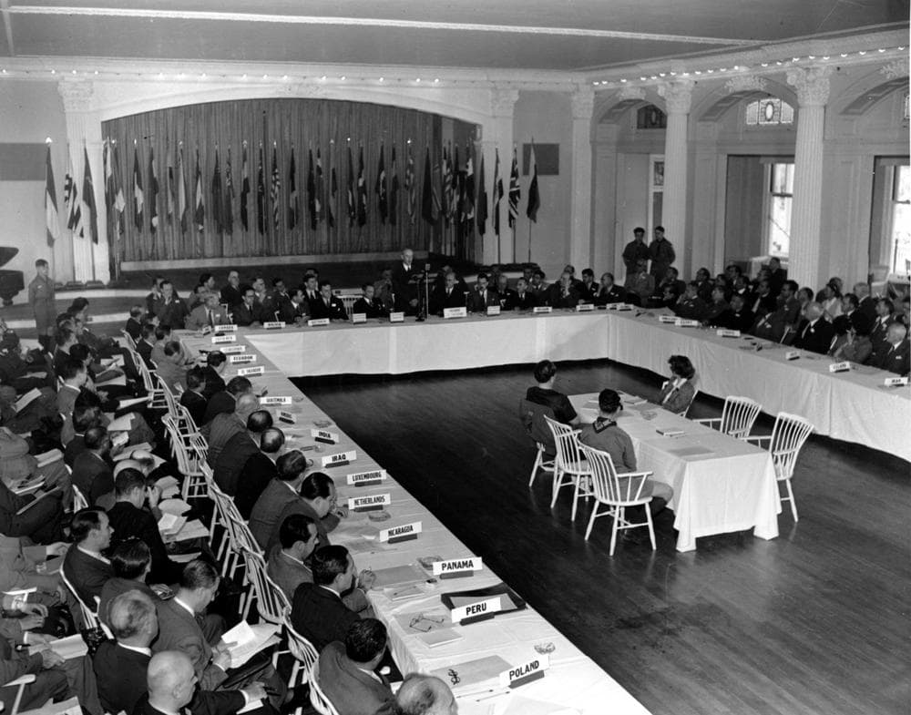 This is a general view of a plenary session of the United Nations Monetary Conference in Bretton Woods, N.H. on July 4, 1944. Delegates from 44 countries are seated at the long tables. Sen. Charles W. Tobey, R-NH, is speaker in center background. (AP Photo/Abe Fox)