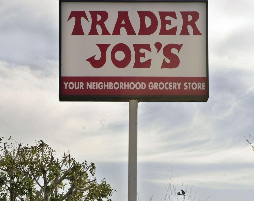 In this Feb. 11, 2008 file photo, a customer departs Trader Joe's in Los Angeles.  (AP Photos/Ric Francis, File)