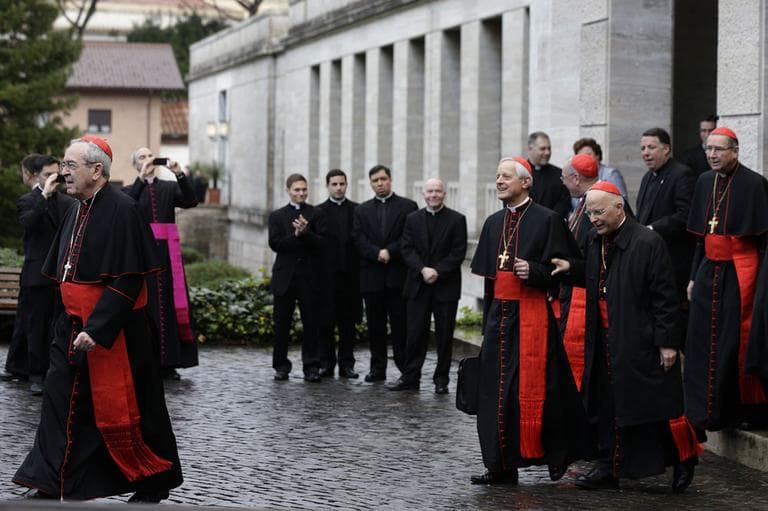 From left, US Cardinals Justin Francis Rigali, Donald Wuerl, Timothy Dolan, Francis George and Roger Mahony leave the North American College to go to the Vatican's Domus Sanctae Martae, the Vatican hotel where the cardinals stay during the conclave, in Rome, Tuesday March 12, 2013. (AP)