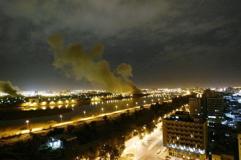  In this March 20, 2003 file photo, smoke rises from the Trade Ministry in Baghdad after it was hit by a missile during US-led forces attacks. (AP)