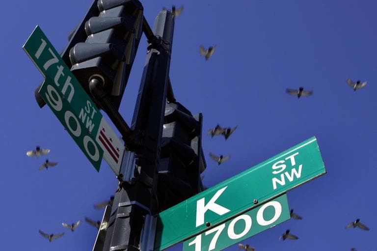 In this Jan. 26, 2006, file photo pigeons fly over the intersection of 17th and K streets in northwest Washington Thursday, Jan. 26, 2006. K Street has long been invoked as shorthand for moneyed lobbyists who ply influence in the city. (AP)