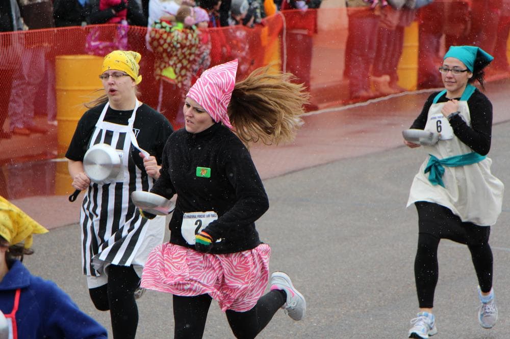 Racers compete in the annual pancake race in Liberal, Kansas. (Only A Game)