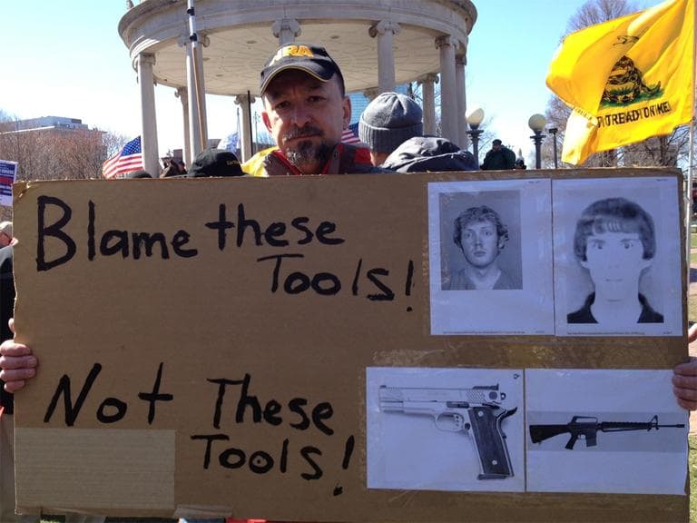 At a rally on Boston Common Wednesday, a self-described &quot;concerned citizen&quot; and father said murderers, not weapons, should take the blame for killings. (State House News Service)