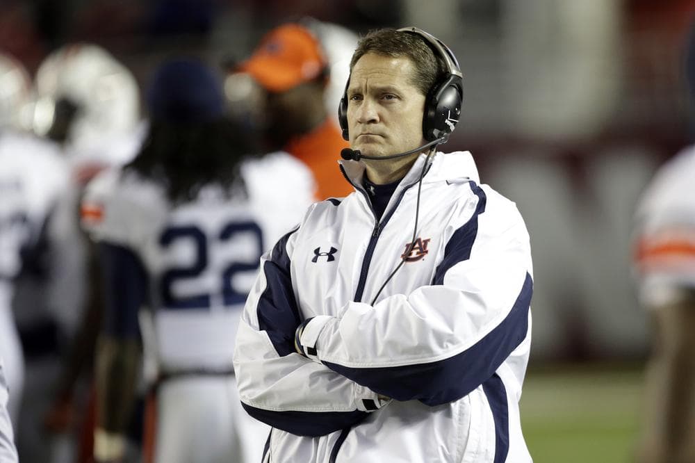 Former Auburn coach Gene Chizik has come under scrutiny following allegations that Auburn paid players and changed grades. (Dave Martin/AP)