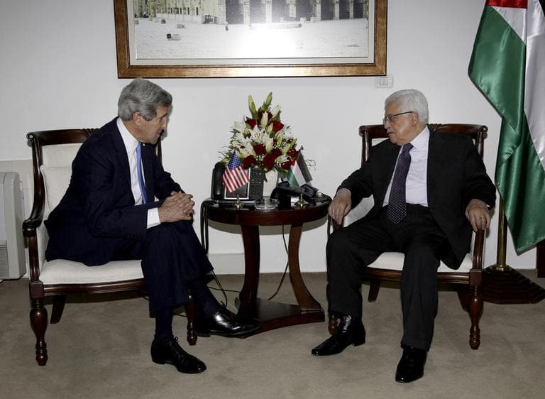 Palestinian President Mahmoud Abbas, right, meets with U.S. Secretary of State John Kerry in the West Bank city of Ramallah Sunday, April 7, 2013. (Mohamed Torokman/AP Pool)