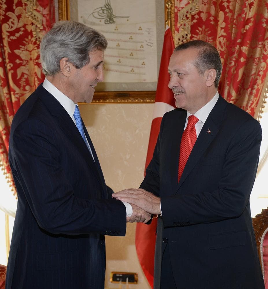 In this photo released by the Turkish Prime Minister's Press Office, Turkish Prime Minister Recep Tayyip Erdogan, right, and U.S. Secretary of State John Kerry shake hands before a meeting in Istanbul, Turkey, Sunday, April 7, 2013. (Kayhan Ozer, Turkish Prime Minister's Press Office, HO/AP)