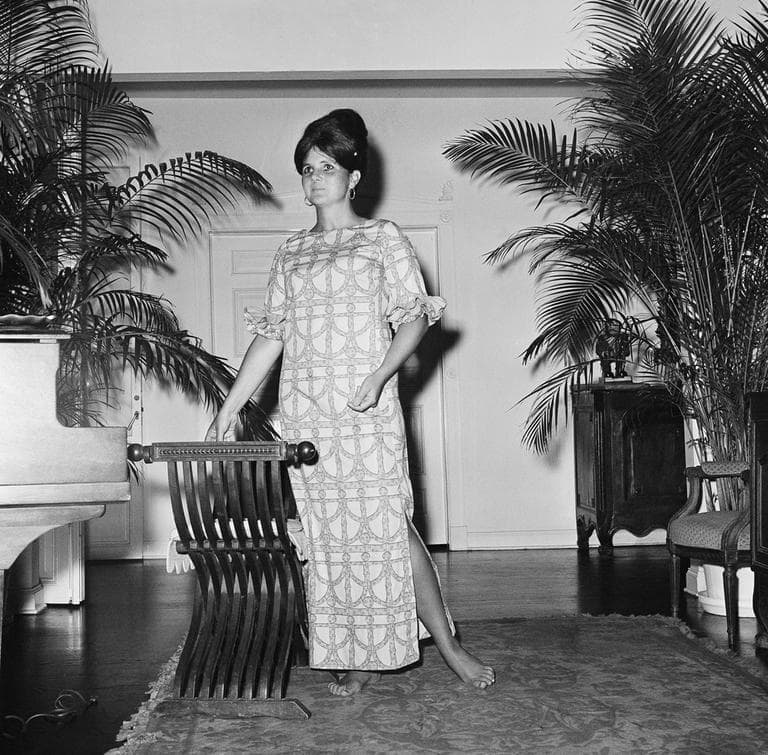 In this March 16, 1965 file photo, fashion designer Lilly Pulitzer wears her own design in Palm Beach, Fla. Pulitzer, known for her tropical print dresses, died in Florida at 81. (Robert H. Houston/ AP File)