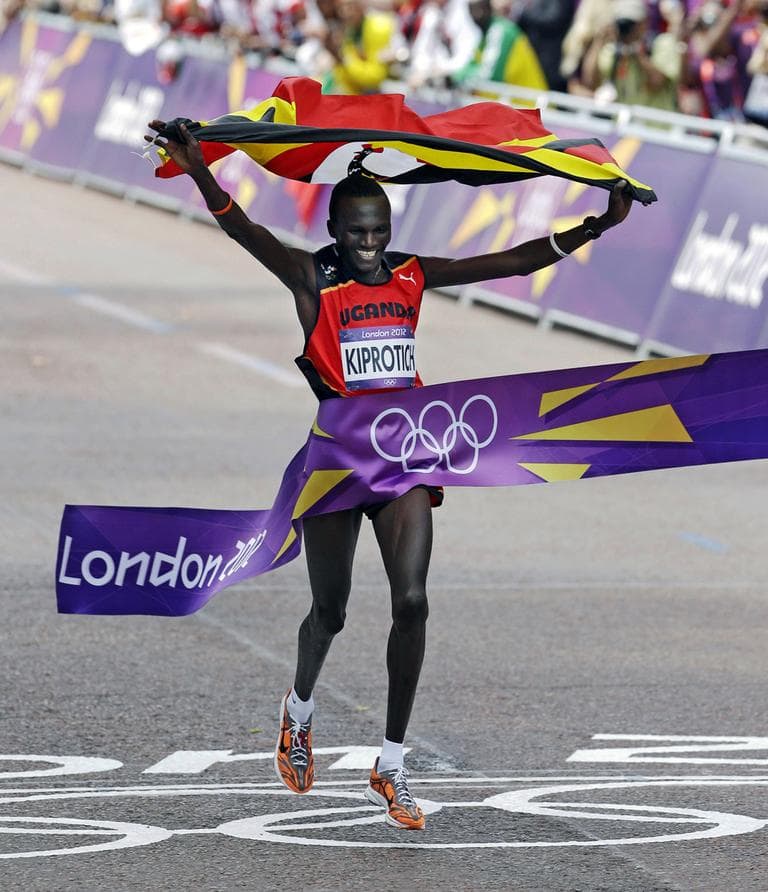 Gold-medalist Stephen Kiprotich of Uganda finishes the men's marathon at the 2012 Summer Olympics, Sunday, Aug. 12, 2012, in London. (Mike Groll/AP)