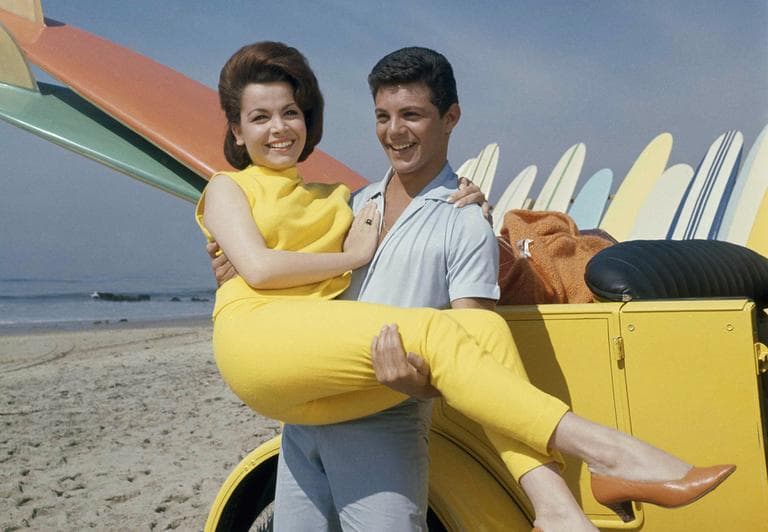 In this 1963 photo, singer Frankie Avalon and actress Annette Funicello are seen on Malibu Beach during filming of &quot;Beach Party,&quot; in California in 1963. (AP)