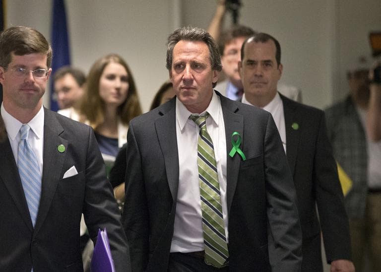 Neil Heslin, center, whose 6-year-old son Jesse was killed in the mass shooting in Newtown, Conn., arrives with other victims&#039; families to meet privately on Capitol Hill in Washington, Tuesday, April 9, 2013.  (J. Scott Applewhite/AP)