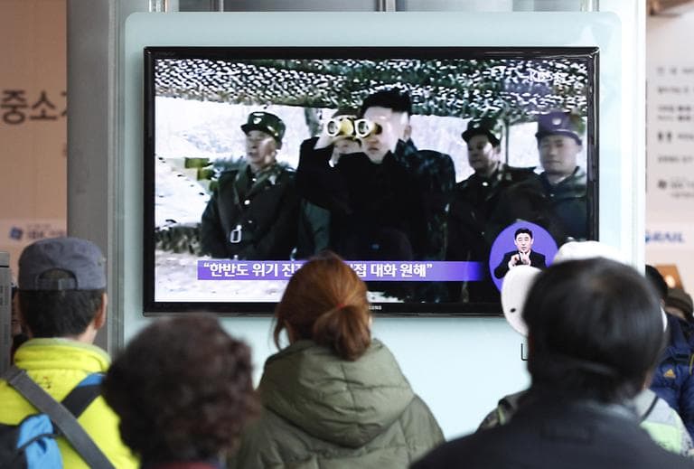 People at Seoul Railway Station in Seoul, South Korea, watch a TV program showing North Korean leader Kim Jong Un, Sunday, April 7, 2013. (Ahn Young-joon/AP)