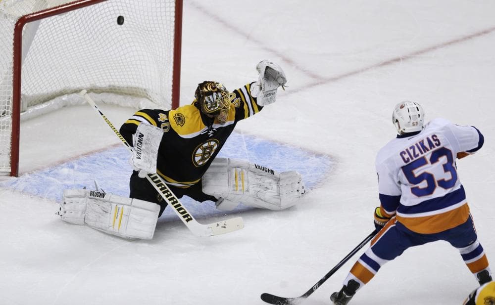 New York Islanders center Casey Cizikas beats Boston Bruins goalie Tuukka Rask for a goal. (AP)