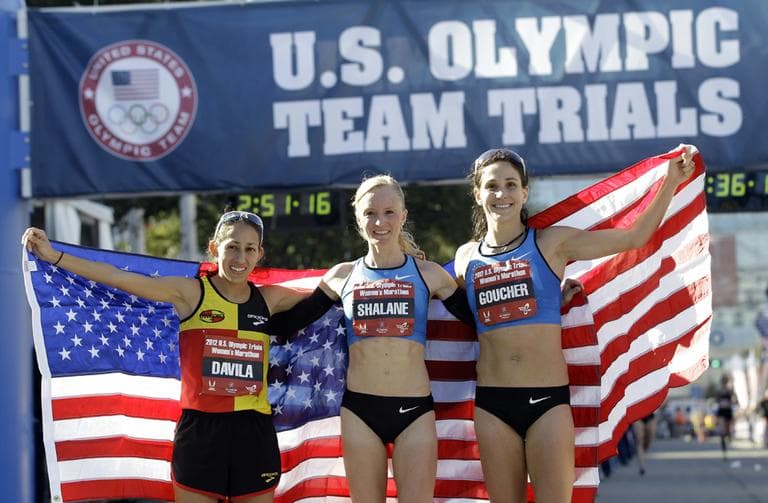 The top three women finishers, from left, Desiree Davila, second, Shalane Flanagan, first, and Kara Goucher, second, pose after running in the U.S. Olympic Trials Marathon, Saturday, Jan. 14, 2012, in Houston. (David J. Phillip/AP)