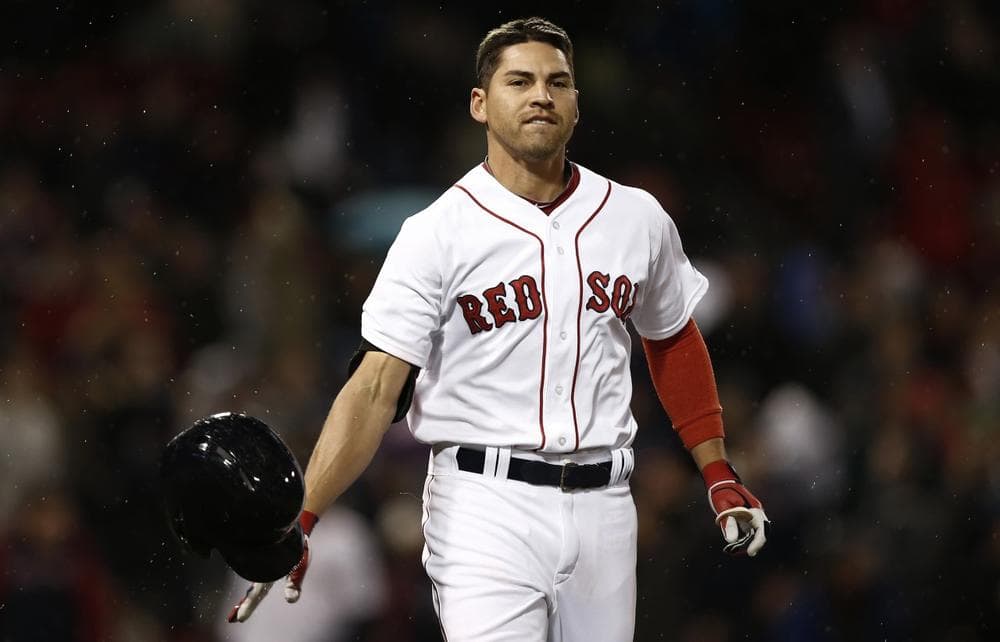 Boston's Jacoby Ellsbury tosses his helmet after recording the final out in the ninth inning. (AP)