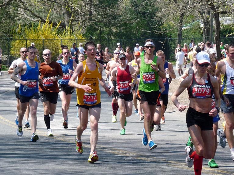 Runners run through Newton in the 2012 Boston Marathon (Lorianne DiSabato/Flickr)