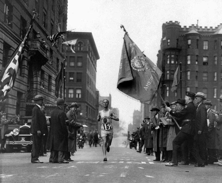 Veteran marathoner Clarence DeMar crosses the finish line April 19, 1930, in Boston, Mass., to win the Boston Marathon for the last of his record seven wins. DeMar's time was 2:34:48.2. (AP)