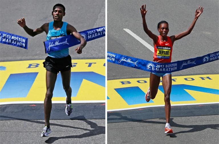 Lelisa Desisa of Ethiopia and Rita Jeptoo of Kenya cross the finish line of the 117th Boston Marathon. (Charles Krupa/AP)