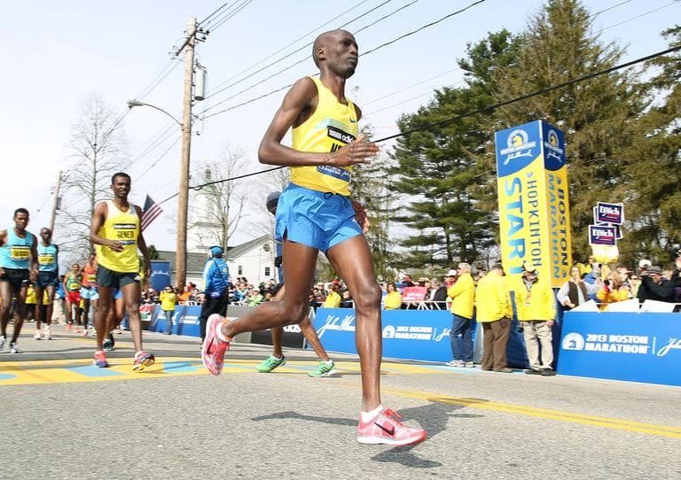 Defending champion Wesley Korir, of Kenya, warms up prior to the start of the 117th running of theBoston Marathon, in Hopkinton, Mass., Monday, April 15, 2013. (Stew Milne/AP)