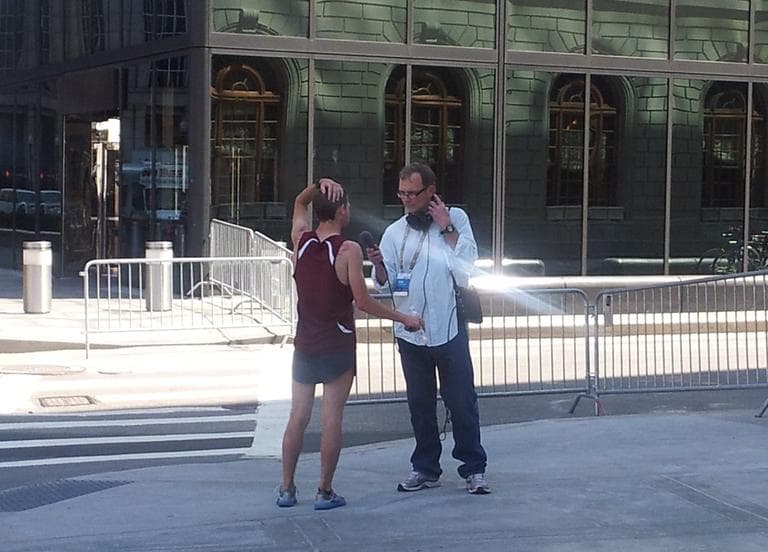 Here &amp; Now's Alex Ashlock is pictured interviewing a runner after the 2012 Boston Marathon. He's been covering the race for 15 years. 