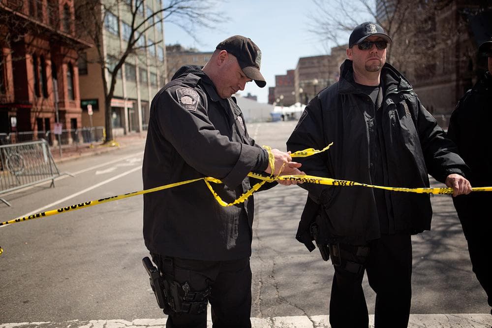 Boston Police set up yellow tape across Fairfield St. (Jesse Costa/WBUR)
