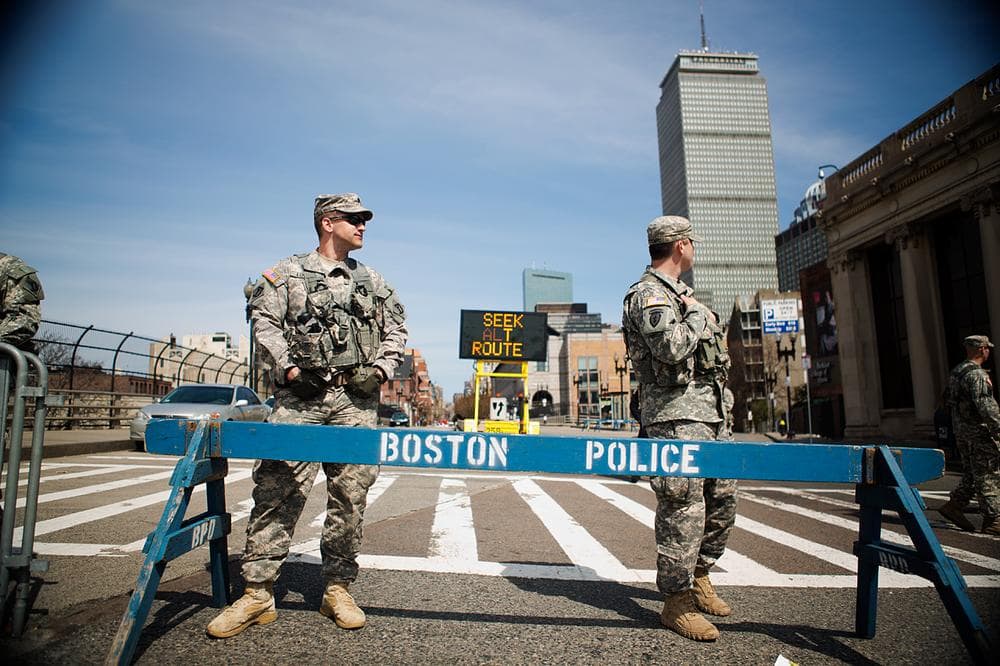 National Guardsmen block off major roads in Boston a day after the explosions. (Jesse Costa/WBUR)