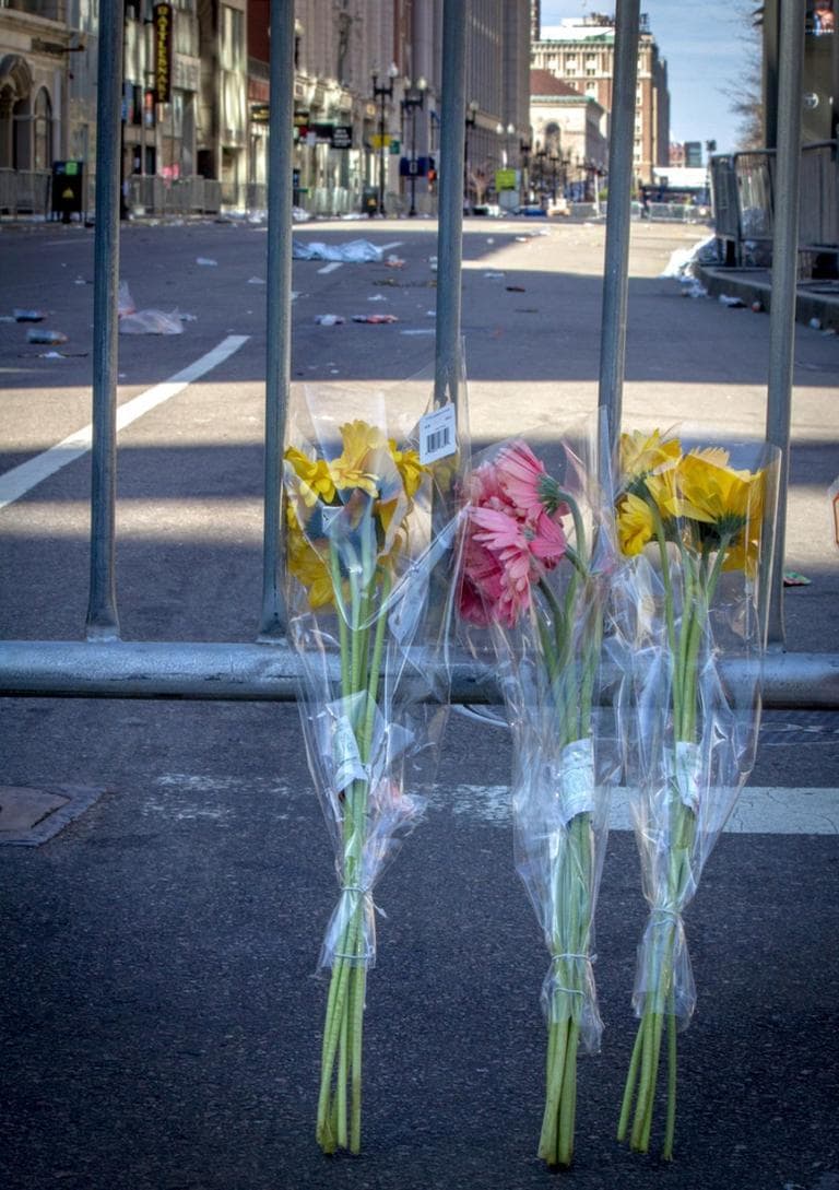 Flowers on Boylston Street. Tuesday, April 16, 2013. (Joe Spurr/WBUR)