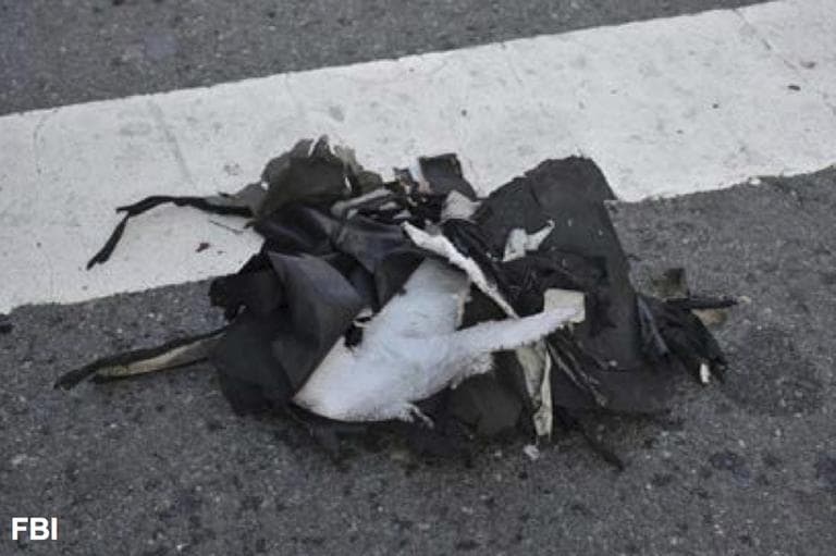 This image from a Federal Bureau of Investigation and Department of Homeland Security joint bulletin issued to law enforcement and obtained by The Associated Press, shows the remains of a black backpack that the FBI says contained one of the bombs that exploded during the Boston Marathon. (FBI/AP)