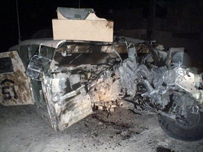 This photo provided by Tom Davis shows the results of an IED that struck his humvee in 2006. (Tom Davis via AP)
