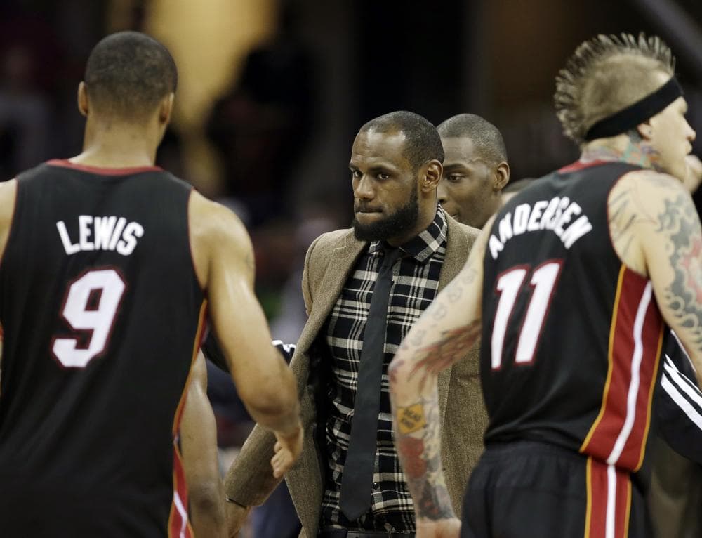 LeBron James sat out Miami's win over Cleveland on April 15, but the Heat will be counting on him in the postseason as they try to repeat. (Mark Duncan/AP)