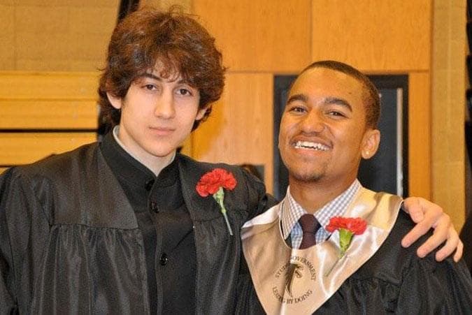 Dzhokhar A. Tsarnaev (left) and Here &amp; Now host Robin Young’s nephew (right) are pictured in a Cambridge Rindge and Latin graduation photo. Tsarnaev has been identified as the surviving suspect in the marathon bombings. (Robin Young/WBUR)