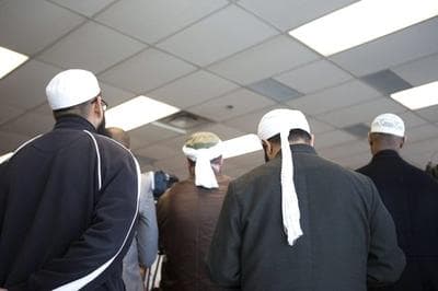 Representatives of Toronto's Islamic community attend a news conference in Toronto as the Royal Canadian Mounted Police announce the arrest of two men accused of plotting a terror attack on rail target, in Toronto, Monday April 22, 2013. (Chris Young/The Canadian Press/AP)