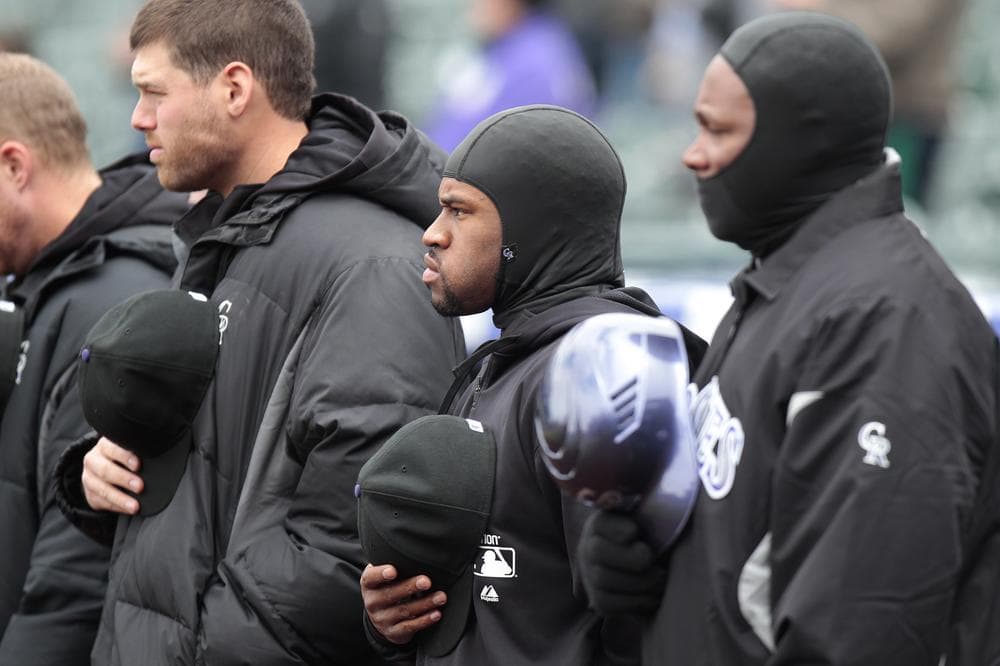 When the Rockies took on the Braves on Tuesday in Denver the temperature was at a record low. (Barry Gutierrez/AP)