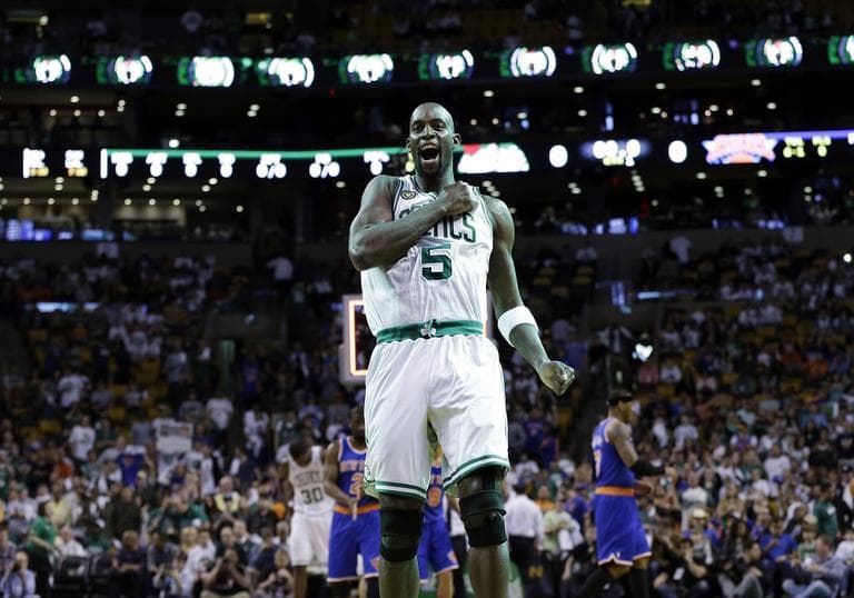 Boston Celtics center Kevin Garnett (5) pounds his chest just before tap-off against the New York Knicks in Game 4 of a first round NBA basketball playoff series. (AP/Elise Amendola)