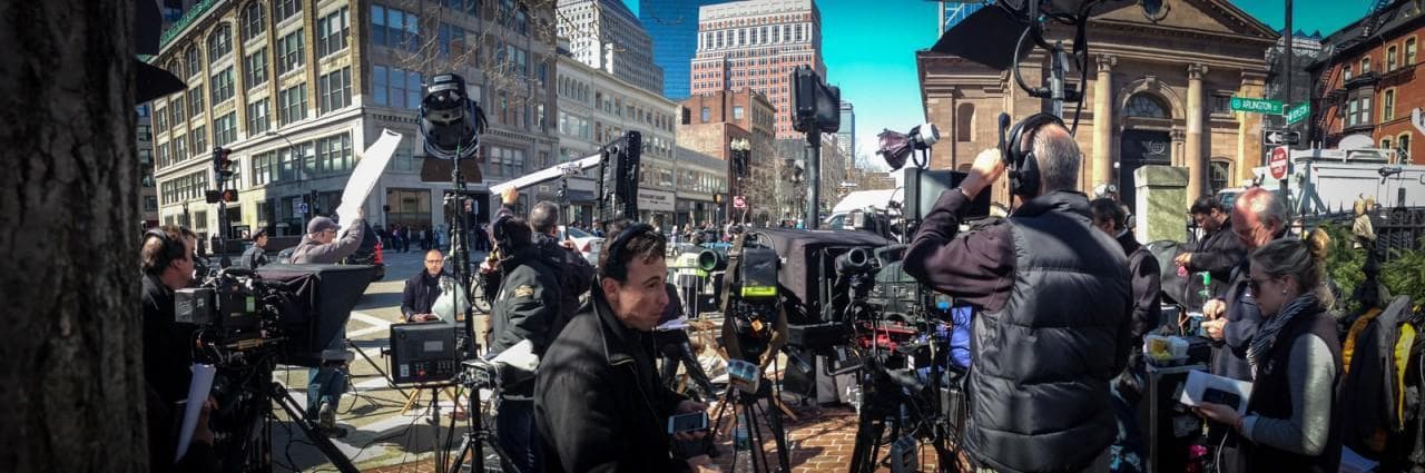 Crew for The Today Show and other media crowd together on the corner of Boylston and Arlington Streets on Tuesday, April 16, 2013. (Joe Spurr/WBUR)