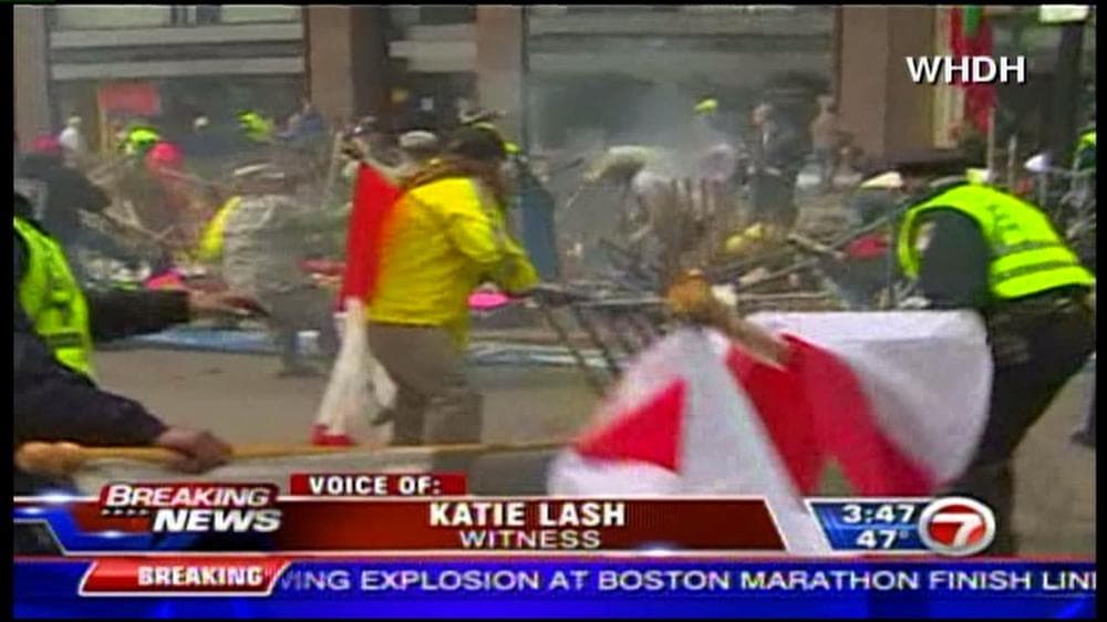 A screen grab of breaking news of the Boston marathon bombings appearing on a tv station in Modesto, California. 