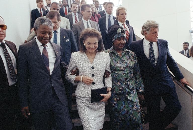 Jacqueline Kennedy Onassis walks with Nelson Mandela and Sen. Edward Kennedy through the JFK Library during Mandela’s June 1990 visit to Boston. (Peter Southwick/AP)