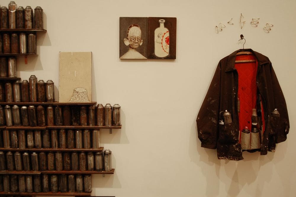 Barry McGee's coat and spraycans. (Greg Cook)