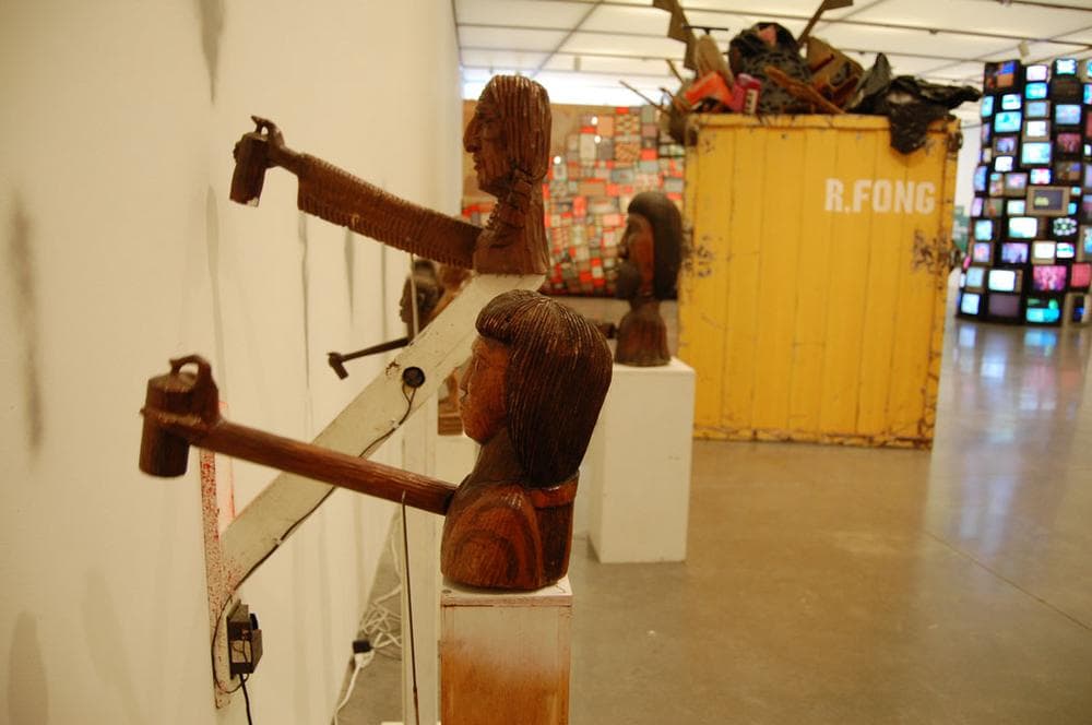 Barry McGee's animatronic wood and styrofoam taggers from 2004/2012. (Greg Cook)
