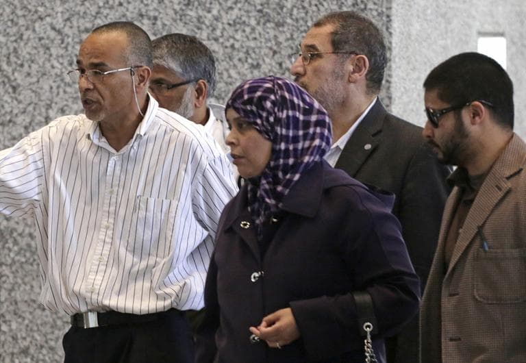 Family and supporters of 18-year-old Abdella Ahmad Tounisi, including his father, Ahmad Tounisi, left, leave federal court Thursday, May 2, 2013, in Chicago, after a federal judge agreed to release the Illinois teenager charged with trying to join an al-Qaida-linked militant group in war-torn Syria. (M. Spencer Green/AP)