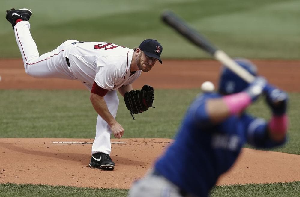 Boston Red Sox starting pitcher Ryan Dempster delivers against the Toronto Blue Jays in the first inning. (AP)