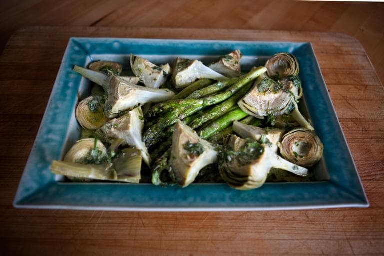 Kathy Gunst's &quot;Braised Artichokes with Roasted Asparagus and a Mint-Chive Dressing.&quot; (Jesse Costa/WBUR)