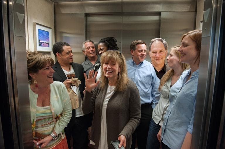 Here &amp; Now and WBUR staffers crowd into the elevator with host Robin Young and ... is that Robert Krulwich? (Doug Shugarts/Here &amp; Now with Emma-Jean Weinstein)