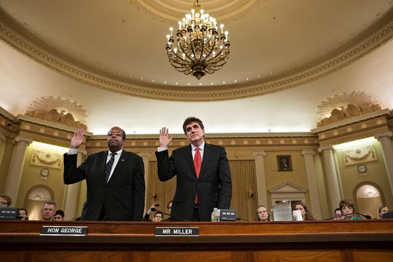 Ousted IRS chief Steven Miller, right, and J. Russell George, the Treasury inspector general for tax administration, are sworn in on Capitol Hill, in Washington, Friday, May 17, 2013, prior to testifying before the House Ways and Means Committee hearing on the extra scrutiny the IRS gave Tea Party and other conservative groups that applied for tax-exempt status. (J. Scott Applewhite/AP)
