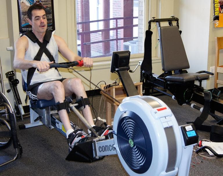 &quot;You can’t rest your laurels on just sitting around and waiting for a cure,&quot; said David Estrada, seen here rowing at Spaulding Rehabilitation Hospital Cambridge. (Lynn Jolicoeur/WBUR)