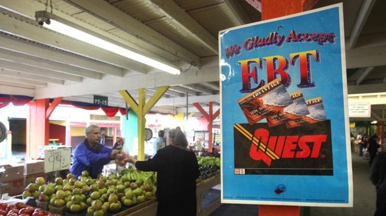 In this 2010 photo, a sign announcing the acceptance of electronic Benefit Transfer cards is seen at a farmers market in Roseville, Calif. (Rich Pedroncelli/AP)