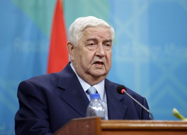 Syrian Foreign Minister Walid Moallem attends a press conference in Baghdad, Iraq, Sunday, May 26, 2013. (Hadi Mizban/AP)