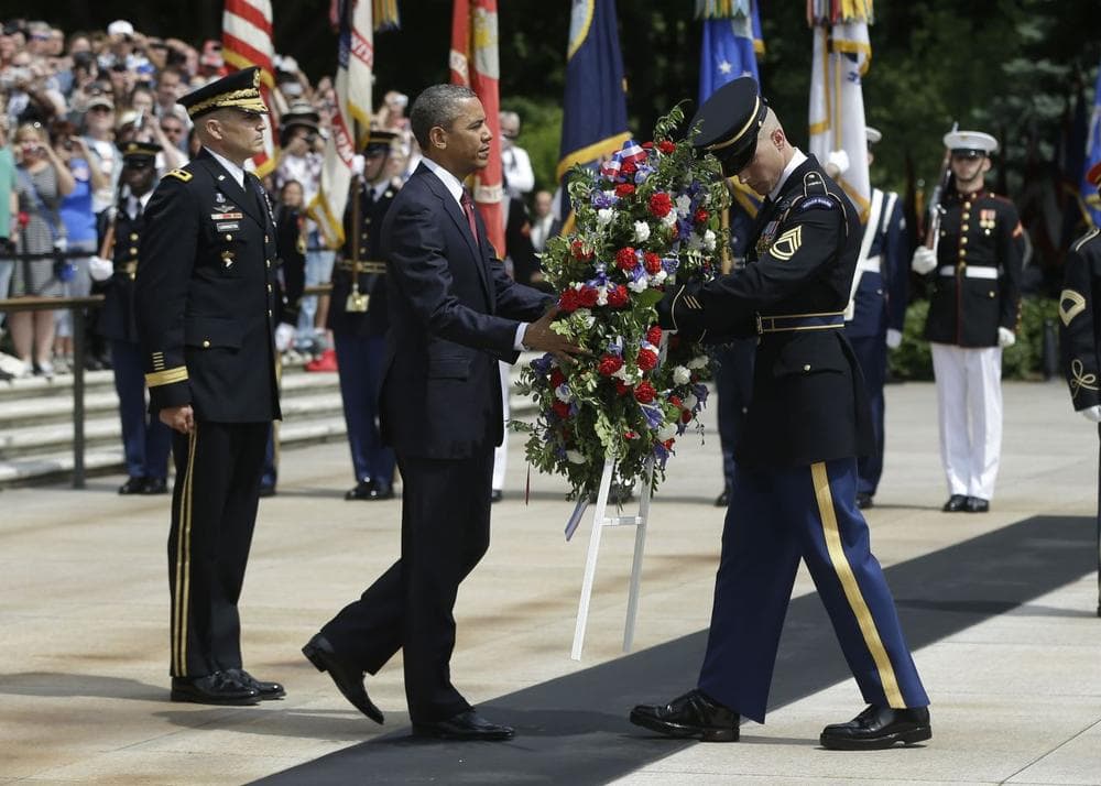 President Obama lays a wreath at the Tomb of the Unknowns at Arlington National Cemetery on Memorial Day, May 27, 2013. (Pablo Martinez Monsivais/AP)